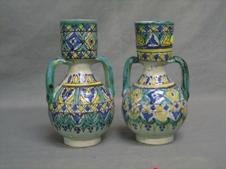 A pair of Ismic pottery twin handled vases 9"