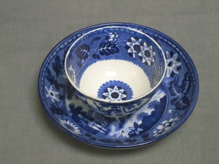 A 19th Century More & Co blue and white transfer decorated pottery teabowl and saucer some chips to the rim