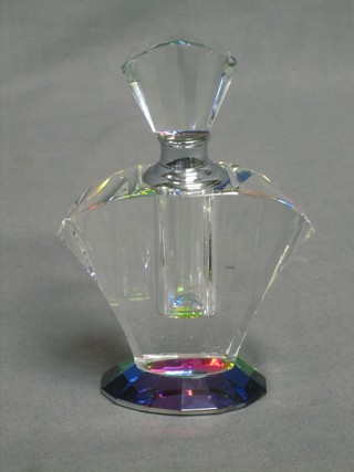 A shaped clear glass scent bottle and stopper 5"