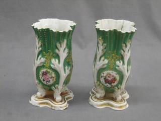 A pair of 19th Century shaped Continental porcelain vases with floral decoration 7" (1f and r)