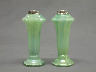 A pair of green opaque glass vases with silver collars 7"