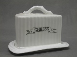 A white glazed wedge shaped cheese dish and cover 8" 