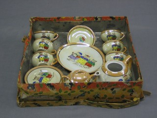 A childs 18 piece nursery tea service decorated The Three Piggies comprising teapot (no lid), twin handled sugar bowl, 6" serving plate, 5 plates 4", 6 cups and 3 saucers, contained in a cardboard box