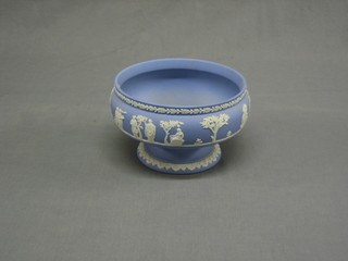 A circular blue Wedgwood Jasperware pedestal bowl, the base impressed 71, 8"