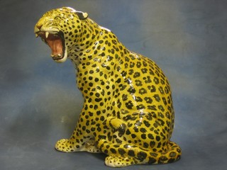 A pottery figure of a seated Leopard 24"
