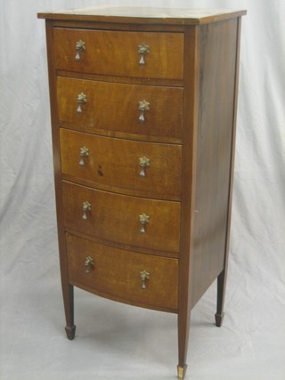 A 1930's Georgian style walnut bow front pedestal chest of 5 long drawers, raised on square tapering supports ending in spade feet 19"