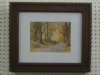 Watercolour drawing "Woodland Glade" indistinctly signed to bottom right hand corner 5 1/2" x 7" contained in an oak frame