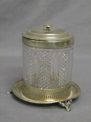 A Victorian cylindrical moulded glass biscuit barrel and cover with plated mounts