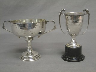A silver twin handled trophy cup, Birmingham 1908 and 1 other Birmingham 1924, 7 ozs