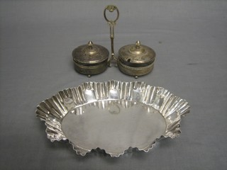 A Continental silver plated and glass cylindrical twin division preserve jar together with an oval shaped dish 10"