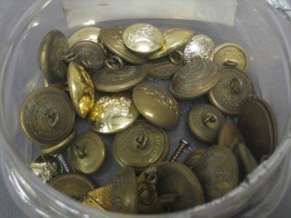 A collection of military buttons