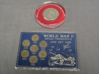 6 George VI thruppeny bits 1939-1945 together with a paperweight decorated Winston Churchill for the Royal Tournament