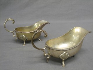 A pair of silver plated sauce boats