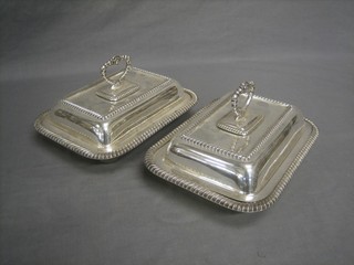 A handsome pair of rectangular silver plated entree dishes and covers