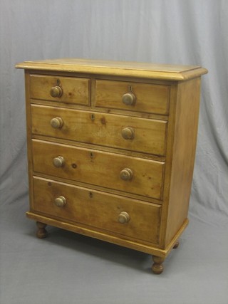 A 19th Century pine chest of 2 short and 3 long drawers with tore handles 36"
