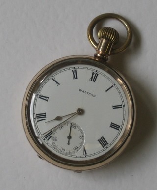 A gentleman's open faced pocket watch by Waltham contained in a gold plated case