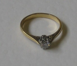 A lady's 18ct yellow gold dress/engagement ring set a solitaire diamond