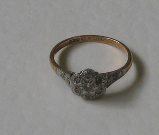 An 18ct gold dress ring set illusion cut diamonds