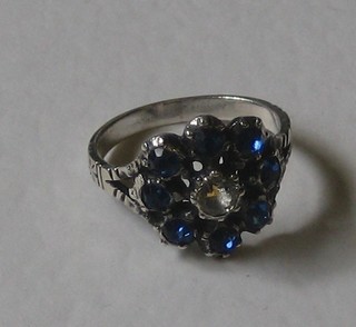 A lady's dress ring set blue stones