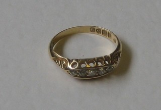 A lady's 18ct yellow gold dress ring set 5 diamonds