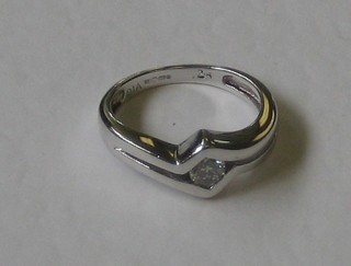 A lady's 18ct white gold dress ring set a diamond
