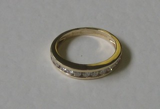 A lady's 9ct gold half eternity ring set diamonds, approx 0.50ct 