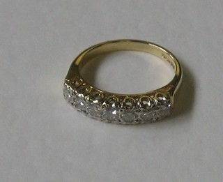 A lady's 18ct yellow gold half eternity ring set 7 diamonds, approx 0.50ct