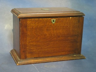 An Edwardian rectangular oak stationery box with hinged lid 14"