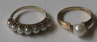 A 9ct gold dress ring set a demi-pearl and 1 other gold dress ring set 7 pearls