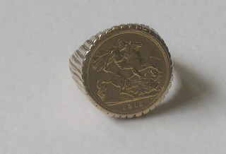 A gilt metal "sovereign" ring