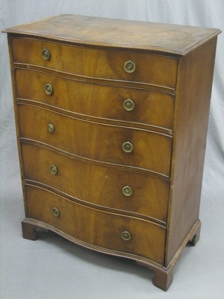 A Georgian style bleached mahogany chest of serpentine outline, fitted 5 long drawers, raised on bracket feet 27"