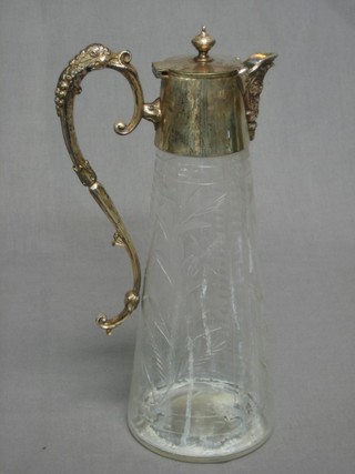 A Victorian cylindrical etched glass claret jug with silver plated mounts 10 1/2"