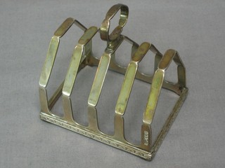 A silver 5 bar toast rack, Sheffield 1925 by Walker & Hall, 3 ozs