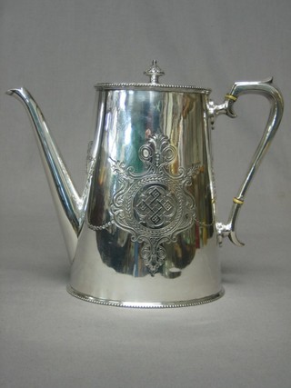 An oval engraved Britannia metal coffee pot