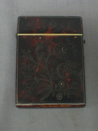 A 19th Century carved tortoiseshell card case with ivory mounts and hinged lid 4"