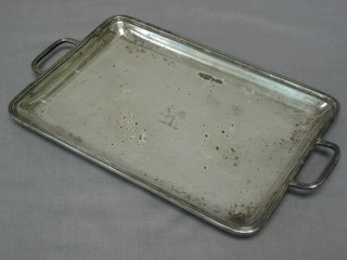 A George III rectangular silver twin handled tray with armorial decoration, London 1792, 9 ozs