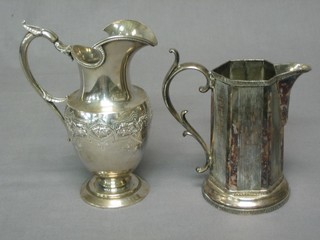 A Victorian embossed silver plated jug and a Britannia metal jug