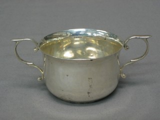 A Victorian silver twin handled porringer, London 1895, 4 ozs