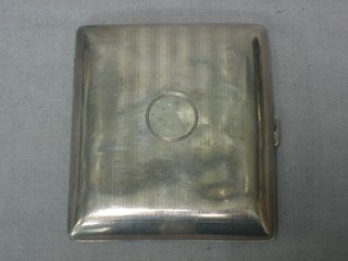 A silver cigarette case Birmingham 1921 3 ozs