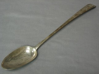 An Antique silver Old English pattern bottom marked serving spoon, marks rubbed, 4 ozs