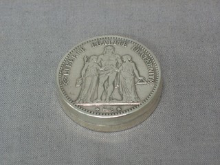A cylindrical trinket box formed from an 1873 Belgian coin and an 1874 5 franc piece