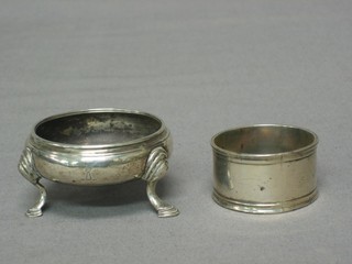 A Georgian circular silver salt and a silver napkin ring, 2 ozs