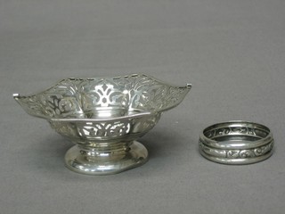 A circular pierced octagonal silver bowl (missing swing handle), Chester and a silver napkin ring 2 ozs