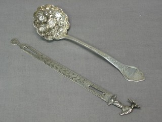 A Victorian embossed silver sifter spoon London 1893 and a Continental silver book mark 2 ozs