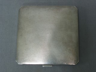 A silver cigarette case with engine turned decoration, Birmingham 1937 2ozs