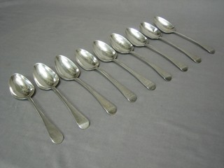 9 George IV silver Old English pattern table spoons, London 1827 with armorial decoration 14 ozs
