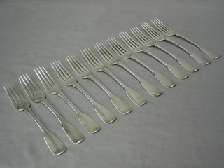 A set of 12 George III fiddle pattern forks, London 1777, 27 ozs