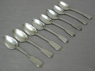 A harlequin set of 8 Georgian and later fiddle pattern pudding spoons, 10 ozs