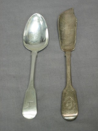 A George III silver fiddle pattern pudding spoon, London 1818 and a Victorian Irish silver fish knife Dublin 1846 4 ozs