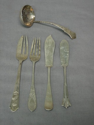 A silver pudding fork, a silver fork, a silver sifter spoon and 2 silver butter knifes, 3 ozs